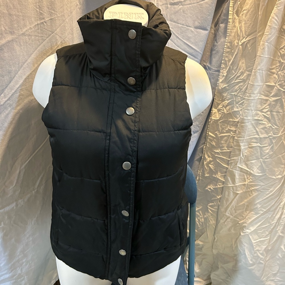 Old Navy- black puffy vest with fleece lining size small